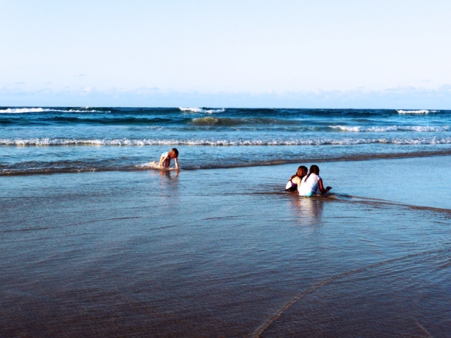 Children playing in the water, Stradbroke Island, Queensland, Australia