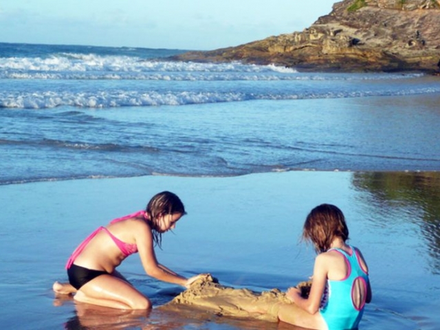 Stradbroke Beach - Playing cricket on the Beach, Qld, Australia